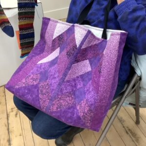 Photo of a purple tote bag made by a member of the cugog Shores Fibre Artists Guild